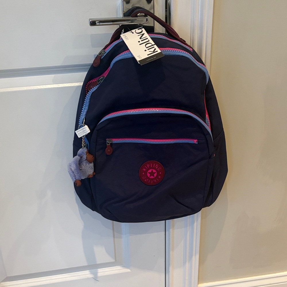 Kipling Dark Blue Backpack with Pink and Light Blue Details